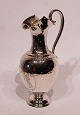 Water jug beautifully decorated of hallmarked silver.
5000m2 showroom.
