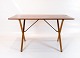 Cross legged coffetable, model AT-308, designed by Hans J. Wegner and 
manufactured by Andreas Tuck. 
5000m2 showroom.
