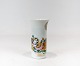 Small porcelain vase decorated with light colours by Bjørn Wiinblad.
5000m2 showroom.