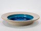 Large ceramic bowl with turquoise glaze by Herman A. Kähler.
5000m2 showroom.