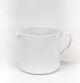 White fluted jug, no.: 441 by Royal Copenhagen.
5000m2 showroom.
