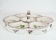 Ceramic cabaret dish decorated with flowers by Axel Brüel from around the 1930s.
5000m2 showroom.