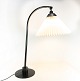 Table lamp, model 366, with black frame by Le Klint.
5000m2 showroom.
