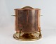 Fondue pot in copper designed. by Jens Quistgaard from the 1960s.
5000m2 showroom.