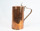 Copper jug with  lid and engravings from Denmark around the 1820s.
5000m2 showroom.