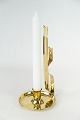 Candlestick of brass in Jugend style from the 1920s.
5000m2 showroom.