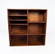 Wall mounted bookcase in teak of danish design from the 1960s. 
5000m2 showroom.