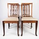Set of four dining room chairs in rosewood and upholstered with light fabric, in 
great antique condition from the 1920s. 
5000m2 showroom.