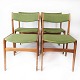 Set of four dining room chairs in teak and green upholstery, designed by Erik 
Buch from the 1960s. Produced at O.D møbler 
5000m2 showroom.
