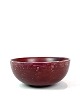 Ceramic bowl with ox blood colored glaze, model 20.717 by Axel Salto for Royal 
Copenhagen. 
5000m2 showroom.
Great condition
