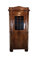 Antique North German corner cabinet in late Empire in polished mahogany from 
around the 1840s.
Dimensions in cm: H: 210 W: 95 D: 47.5
Great condition
