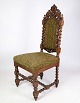 High-backed chair in solid oak with the style of the Renaissance from around the 
year 1910.
Dimensions in cm: H: 118 W: 50 D: 50 SH: 47
Great condition
