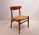 A pair of dining chairs, model CH23, of oak, back of teak and seat of papercord, by Hans J. Wegner, 1960s.5000m2 showroom.