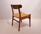 A pair of dining chairs, model CH23, of oak, back of teak and seat of papercord, by Hans J. Wegner, 1960s.5000m2 showroom.