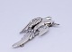 Brooch in the shape of a bird in 925 sterling silver and stamped Monet.5000m2 showroom.